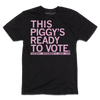 Black t-shirt with light pink ink that says, "This piggy's ready to vote. Tuesday, November 3rd 2026. LFG!"