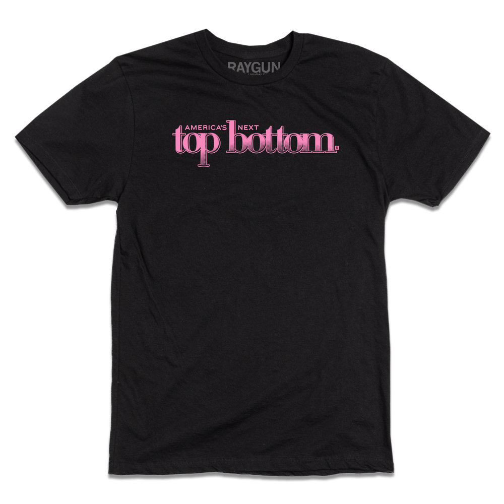 A short sleeve black t-shirt with pink ink that reads "America's Next Top Bottom."