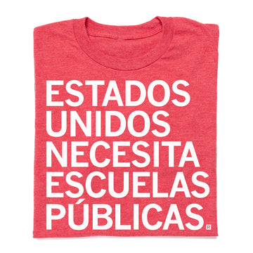 Red heather RAYGUN t-shirt with white text that reads ESTADOS UNIDOS NECESITA ESCUELAS PÚBLICAS.