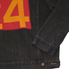 Vintage dark denim jacket with a red patch on the back featuring a large yellow number four.