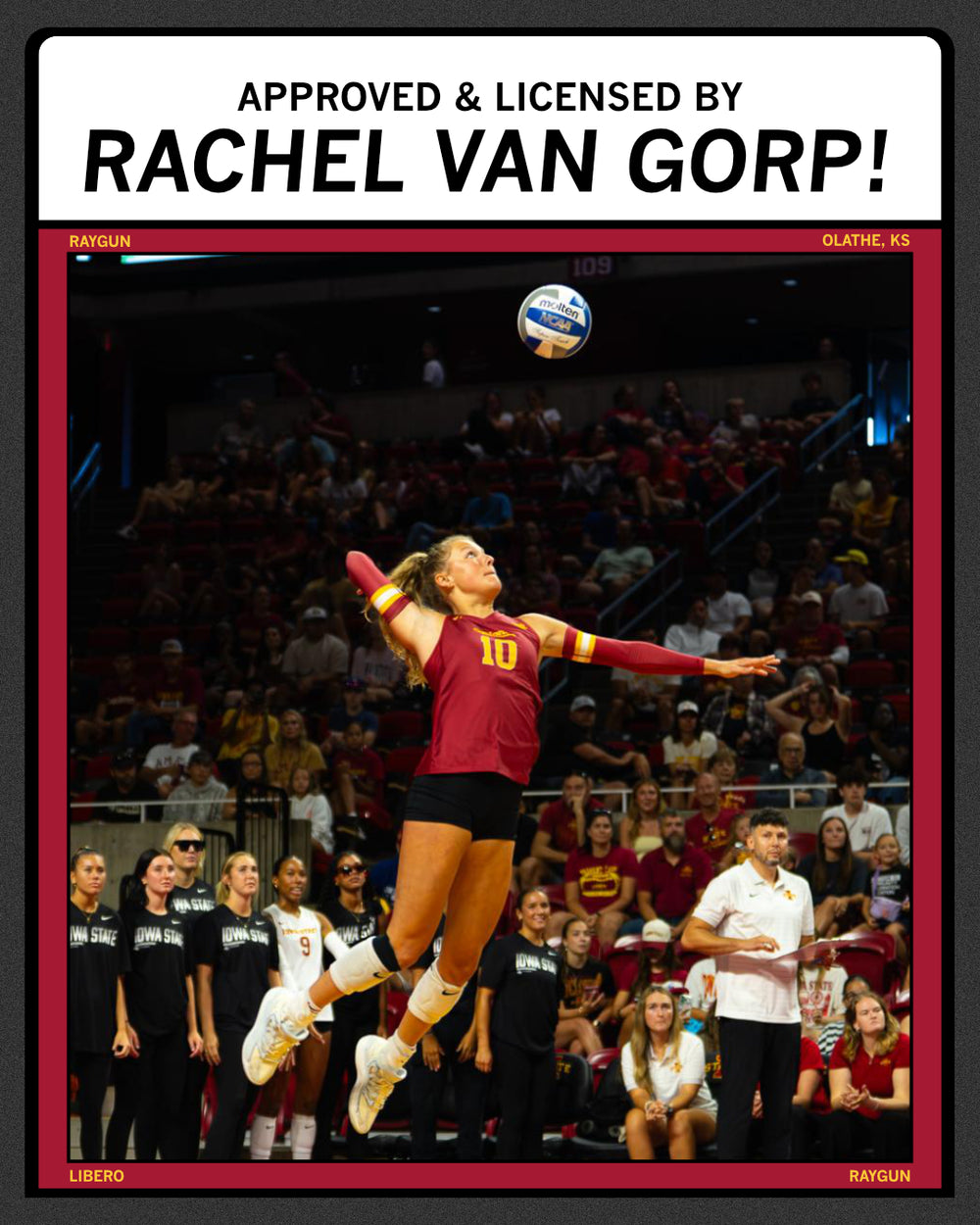 A collegiate volleyball player in a maroon and gold jersey jumps to spike a ball during a game in a crowded arena, wearing a Heather Red T-shirt featuring the text Approved & Licensed by Rachel Van Gorp! and RAYGUN.