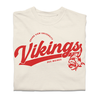 Ivory Comfort Colors shirt with red script text that reads "Grandview University Vikings. Des Moines" with an illustration of the viking logo.