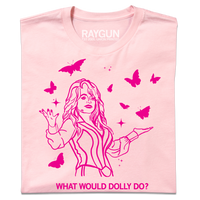 A folded pastel pink t-shirt with hot pink ink depicting Dolly Parton with open arms, surrounding by butterflies and sparkles. All caps text below says, "WHAT WOULD DOLLY DO?"