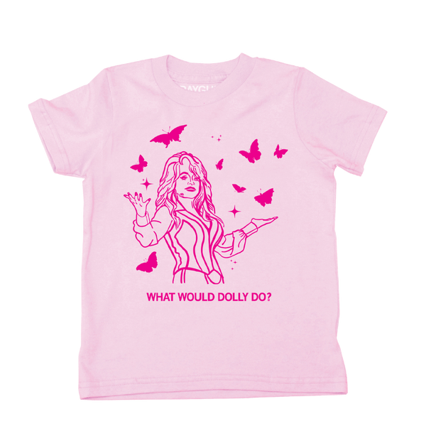 A youth size short sleeve light pink t-shirt with hot pink ink depicting Dolly Parton with open arms, surrounding by butterflies and sparkles. All caps text below says, 