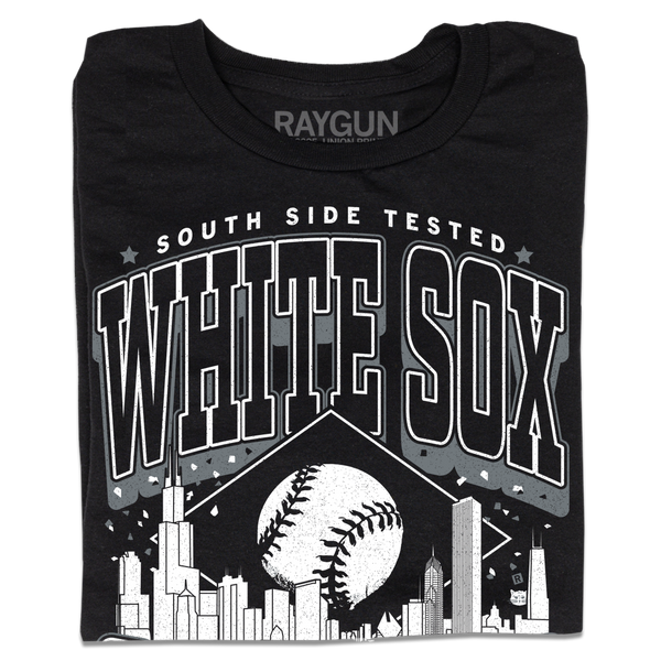 A folded black t-shirt with white ink. Text reads 