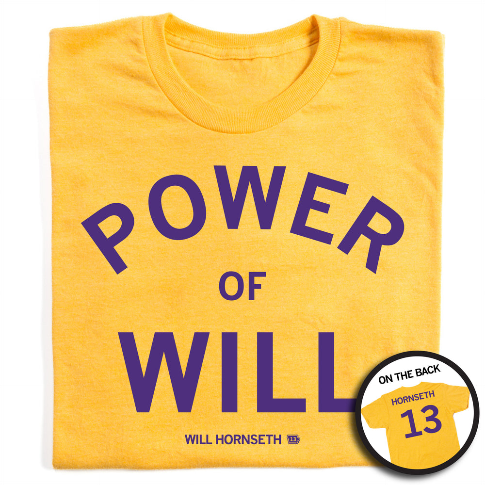 A folded heather gold t-shirt that says "Power of Will. Will Hornseth #13" in purple ink on the front and "Hornseth 13" on the back