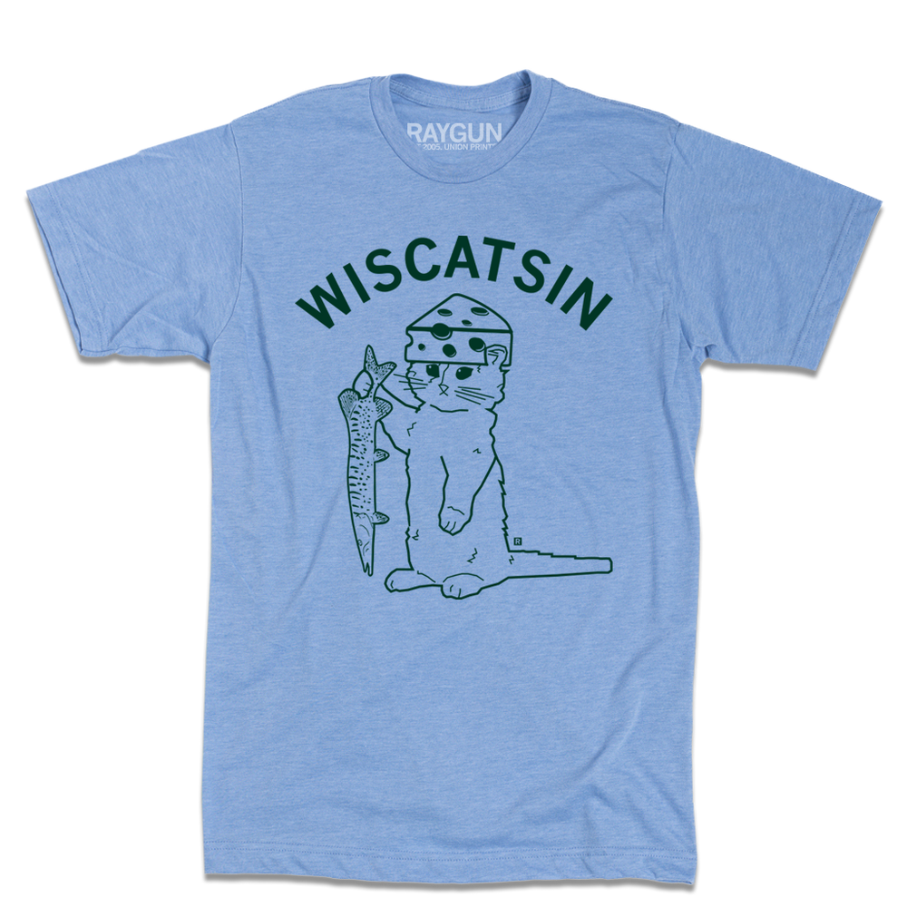A light heather blue shirt with dark green ink. Curved text near the top says, "Wiscatsin" above an illustration of RAYGUN's cat mascot, Gary, wearing a cheese hat and holding a fist.