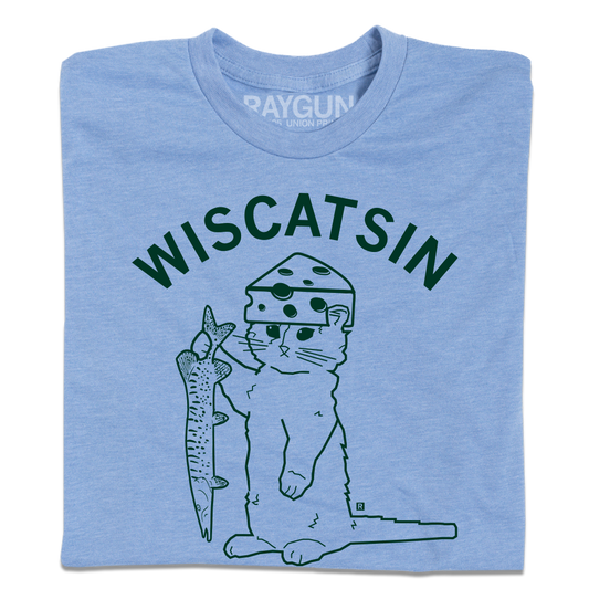 A folded heather blue t-shirt with dark green ink. Curved text near the top says, "Wiscatsin" above an illustration of RAYGUN's cat mascot, Gary, wearing a cheese hat and holding a fist.