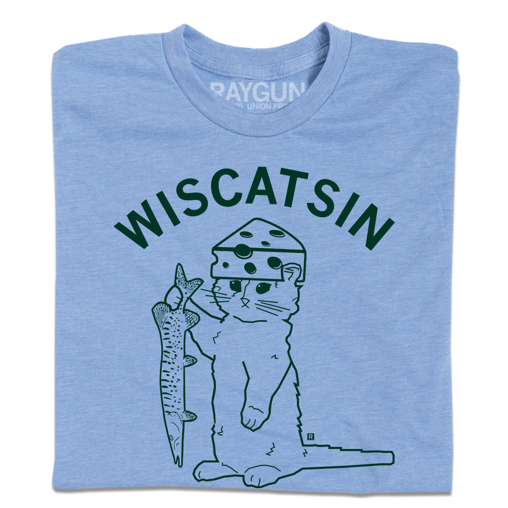 A heather blue t-shirt with dark green ink. Curved text near the top says, "Wiscatsin" above an illustration of RAYGUN's cat mascot, Gary, wearing a cheese hat and holding a fist.
