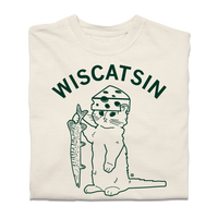 A folded ivory heavyweight t-shirt with dark green ink. Curved text near the top says, "Wiscatsin" above an illustration of RAYGUN's cat mascot, Gary, wearing a cheese hat and holding a fist.