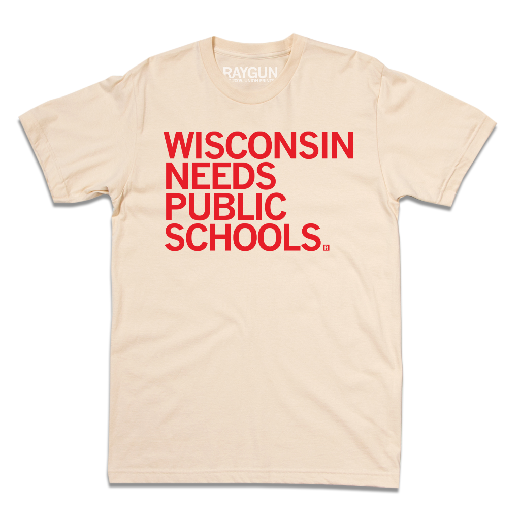 Cream-colored t-shirt featuring the red text WISCONSIN NEEDS PUBLIC SCHOOLS, advocating for strong public education.