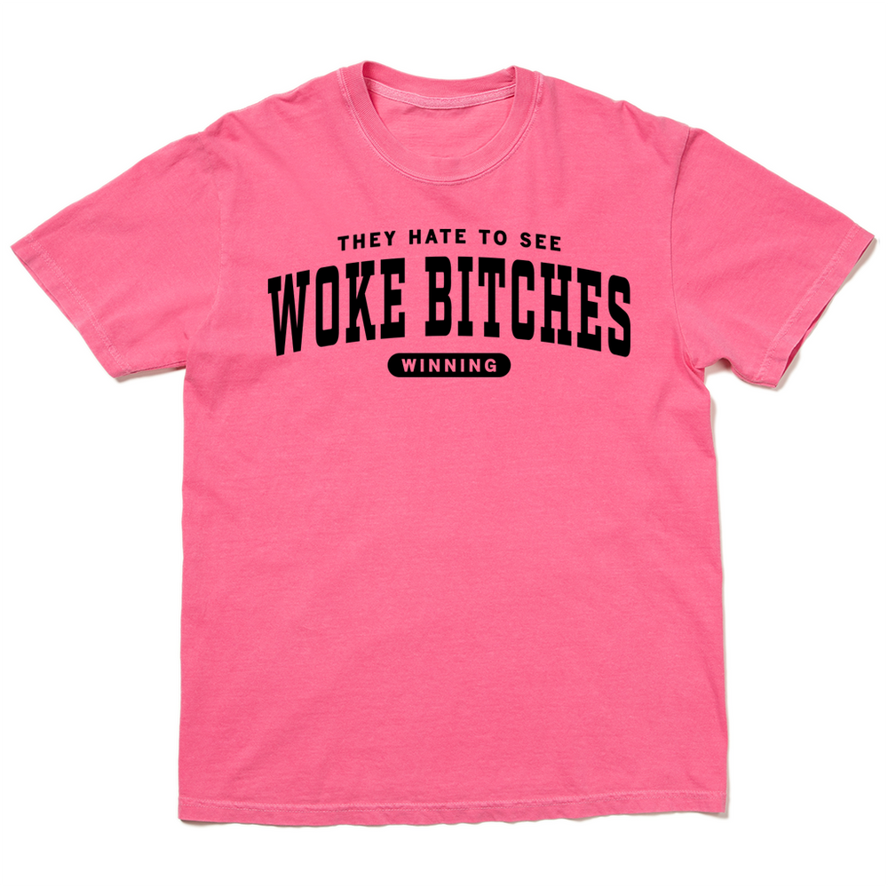 Comfort Colors crunchberry heavyweight t-shirt with black ink text that reads "They hate to see woke bitches winning"