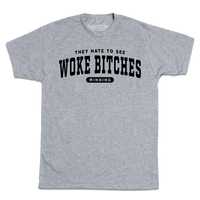 Heather grey tee with black ink text that reads 
"They hate to see 
woke bitches
winning"
