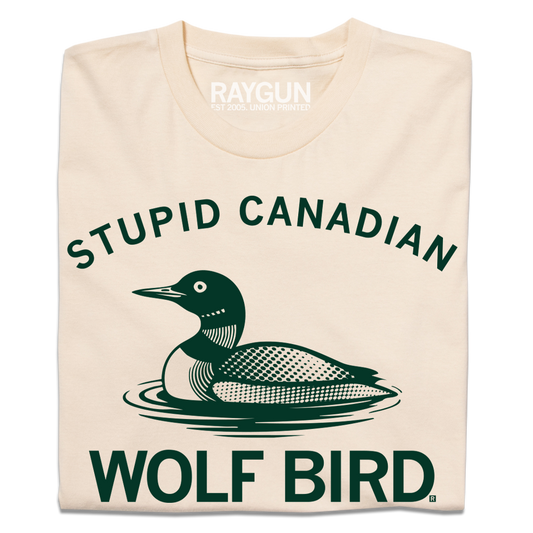 Cream t-shirt with dark green ink that reads "Stupid Canadian Wolf Bird" with in illustration of a Common Loon