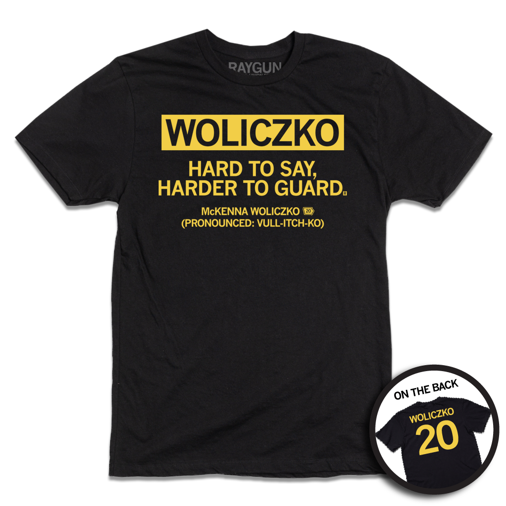 Black shirt with yellow printed text that says, "Woliczko: Hard to say, harder to guard" over "McKenna Woliczko (Pronounced: Vull-itch-ko)"