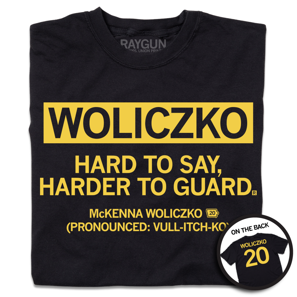 Black shirt with gold text that says, "Woliczko: Hard to say, harder to guard" over "McKenna Woliczko (Pronounced: Vull-itch-ko)"