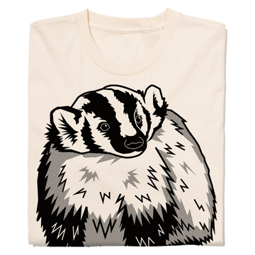 A cream-colored natural t-shirt featuring a black and white graphic of a badger.