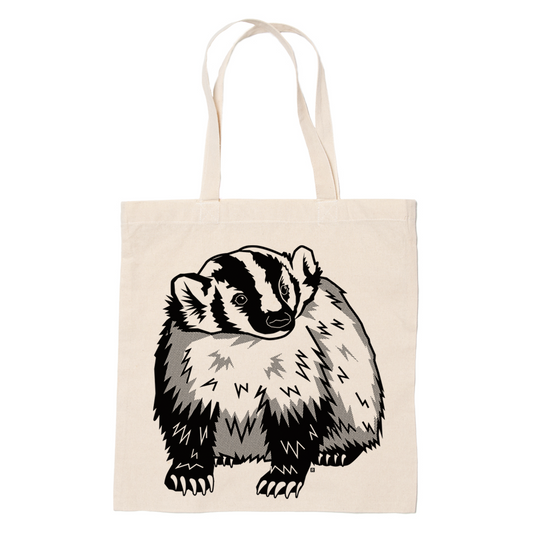 Natural 100% cotton canvas tote bag featuring a black and white illustrated badger.