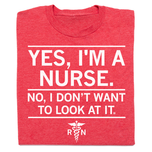 Red RAYGUN t-shirt with white text that reads, Yes, I’m a nurse. No, I don’t want to look at it, above a caduceus symbol with the letters RN on this funny nurse shirt.