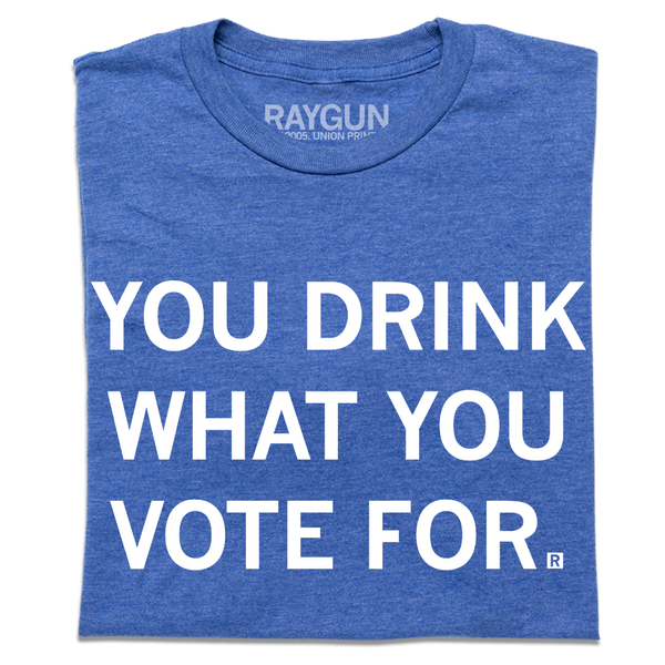 A folded heather royal blue t-shirt with centered white text that says, 