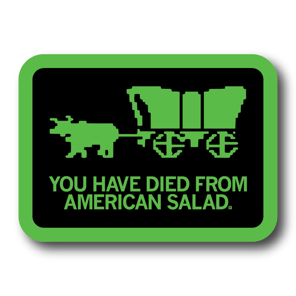 A rectangular black sticker with green outline and image spoofing the Oregon Trail game with text that says, 
