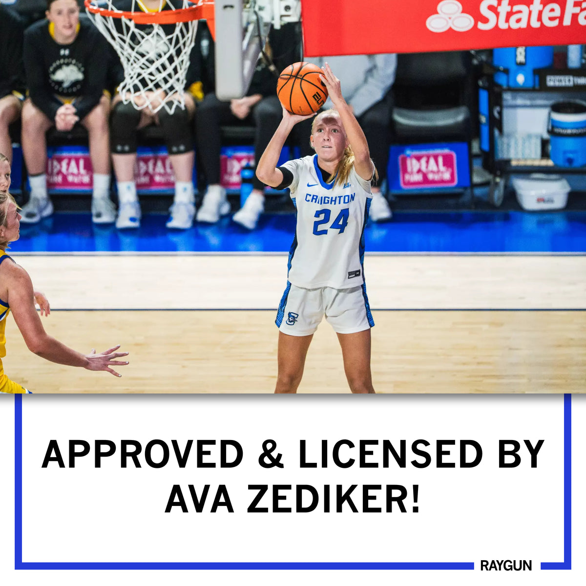 Creighton basketball player Ava Zediker, wearing a white uniform with number 24, takes a jump shot on the court.