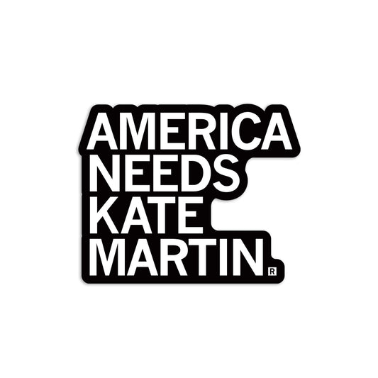 Vinyl sticker with the text AMERICA NEEDS KATE MARTIN in white block letters on a black background, in the signature style of RAYGUN.