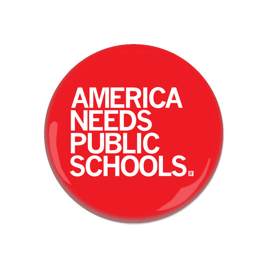 A red RAYGUN circular button featuring the white text AMERICA NEEDS PUBLIC SCHOOLS.