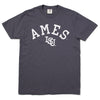 Charcoal grey heavyweight cotton short-sleeve t-shirt with white collegiate-style lettering reading AMES above an ISU logo.