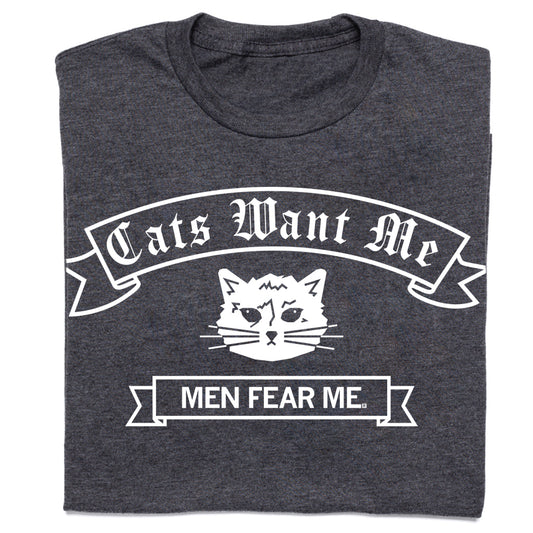 Charcoal grey RAYGUN t-shirt featuring a white graphic of a cat face with a banner above reading Cats Want Me and a banner below reading MEN FEAR ME.