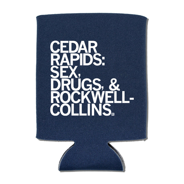 A navy can cooler with white ink that reads 