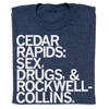 Heather denim blue t-shirt with white text reading CEDAR RAPIDS: SEX, DRUGS, & ROCKWELL-COLLINS.
