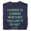 A navy blue, union-made Greta Thunberg crewneck sweatshirt with the text CHANGE IS COMING WHETHER YOU LIKE IT OR NOT in light green, with the activist’s name printed in smaller text below a horizontal line.