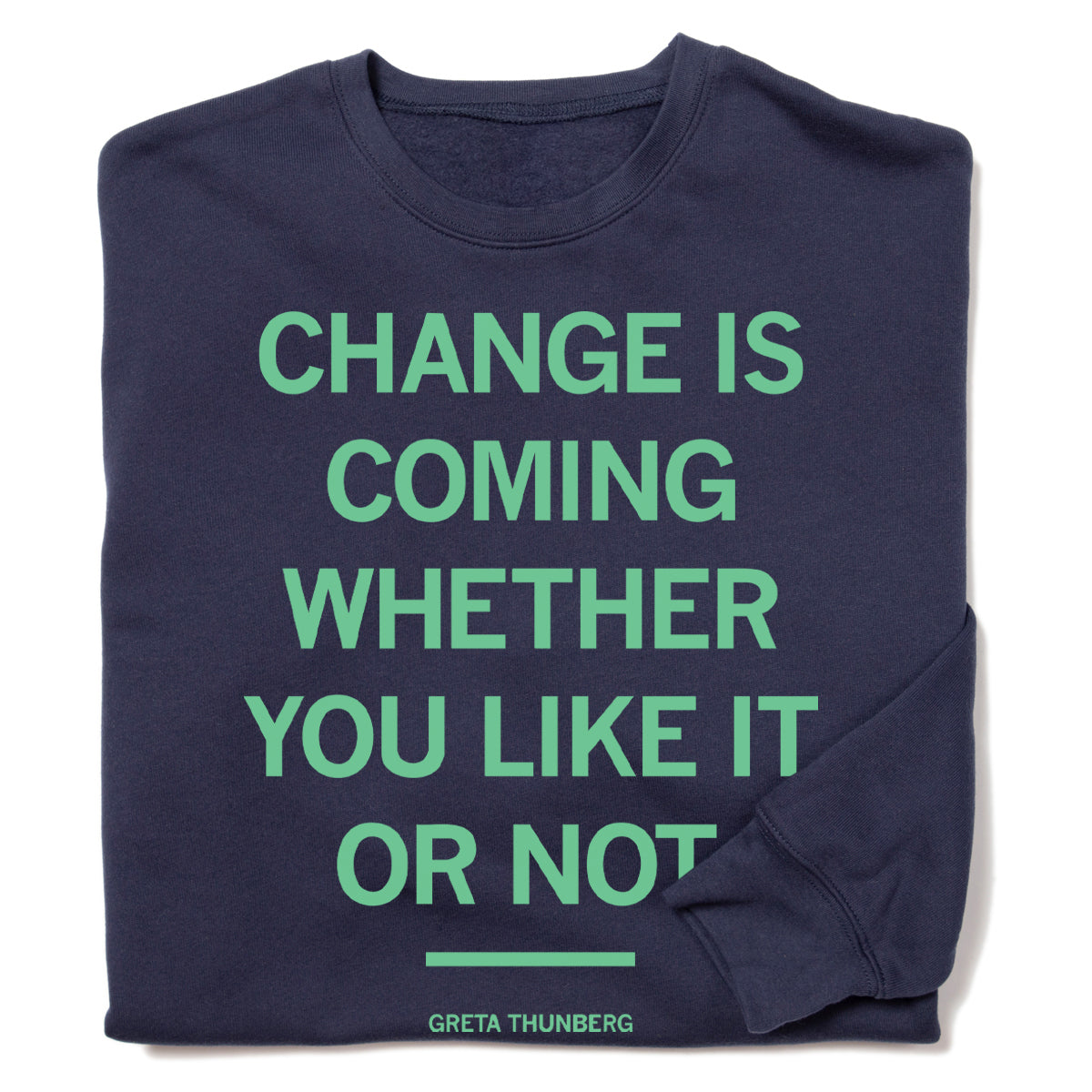 A navy blue, union-made Greta Thunberg crewneck sweatshirt with the text CHANGE IS COMING WHETHER YOU LIKE IT OR NOT in light green, with the activist’s name printed in smaller text below a horizontal line.