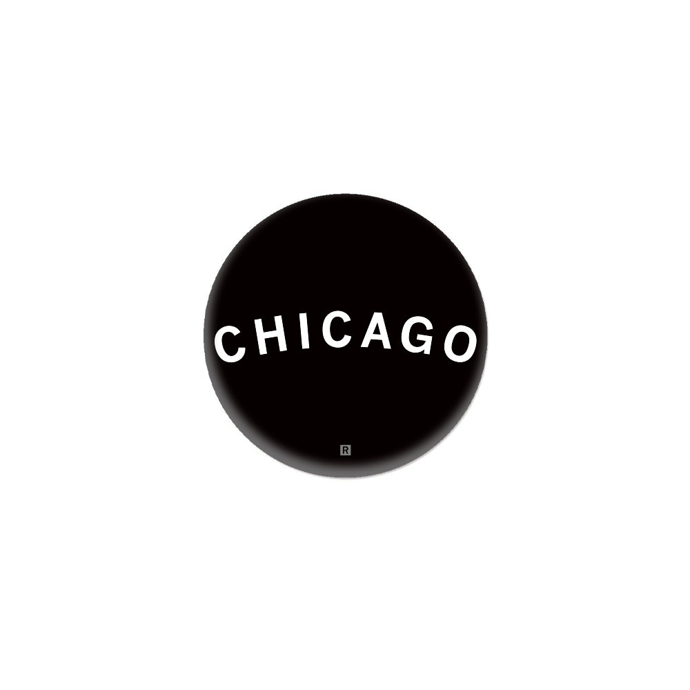 A black circular RAYGUN logo featuring the word CHICAGO in white capital letters with a small R symbol at the bottom.