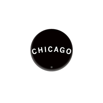 A black circular RAYGUN logo featuring the word CHICAGO in white capital letters with a small R symbol at the bottom.