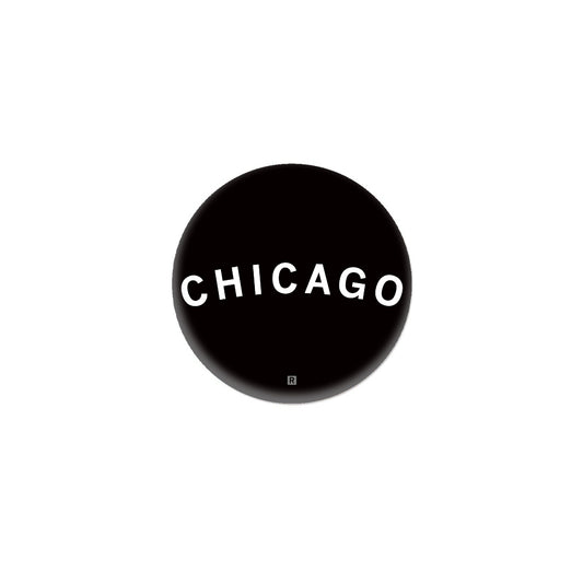 A black circular RAYGUN logo featuring the word CHICAGO in white capital letters with a small R symbol at the bottom.