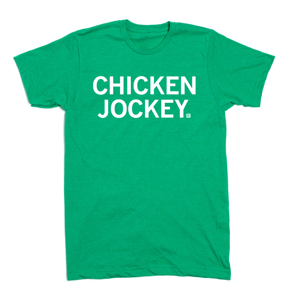 Heather Kelly Green short-sleeved t-shirt with CHICKEN JOCKEY printed in white letters on the chest.