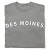Folded, union made gray crewneck t-shirt with DES MOINES printed in white arching text across the chest.