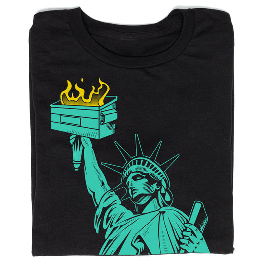 Black, sweatshop-free t-shirt featuring a teal graphic of the Statue of Liberty holding a burning dumpster instead of a torch.