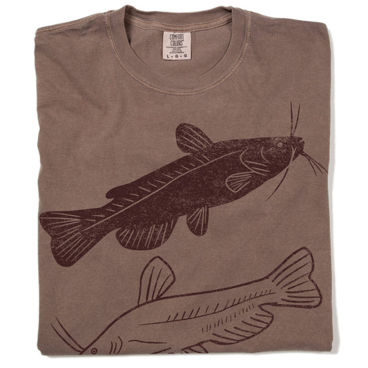 Espresso-colored short-sleeve t-shirt featuring illustrations of a Black Bullhead and a Channel Catfish.