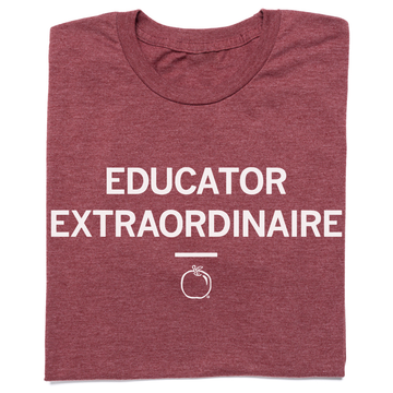 Maroon t-shirt featuring a retired design with the white text EDUCATOR EXTRAORDINAIRE above an apple icon.