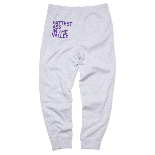 Relaxed fit heather grey sweatpants with FATTEST ASS IN THE VALLEY printed in purple on the back.
