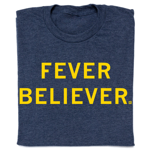 Heather denim t-shirt in navy blue featuring the text FEVER BELIEVER printed in yellow block letters.