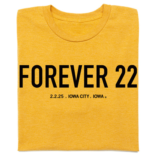 Mustard yellow RAYGUN t-shirt with black text that reads FOREVER 22 above 2.2.25 . IOWA CITY . IOWA.