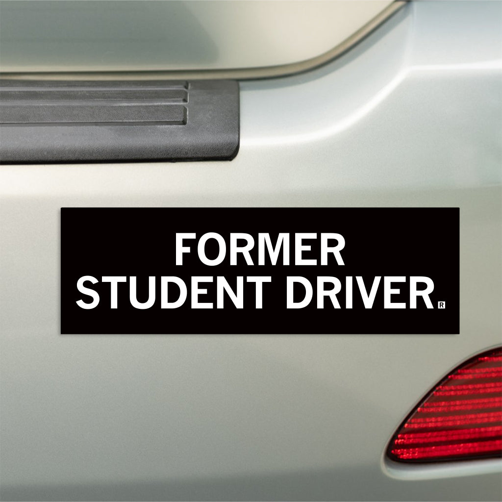 A black Former Student Driver bumper magnet displayed on a car.
