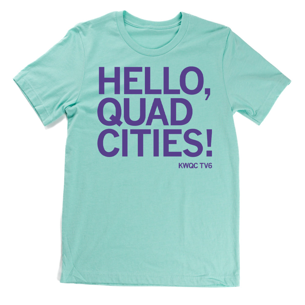 Light blue Paula Sands Live t-shirt with purple text that reads, HELLO, QUAD CITIES! KWQC TV6.