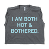 Charcoal gray garment-dyed muscle crop top featuring the text I AM BOTH HOT & BOTHERED. in light blue letters.