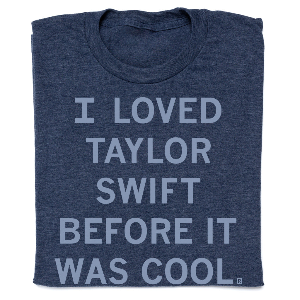 A heather denim Taylor Swift t-shirt featuring the text I LOVED TAYLOR SWIFT BEFORE IT WAS COOL.