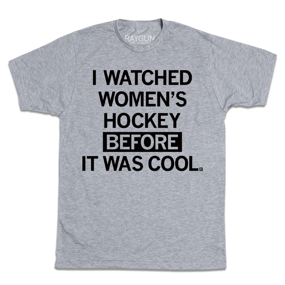 Heather grey t-shirt with centered black in text that reads "I Watched Women's Hockey Before It Was Cool"